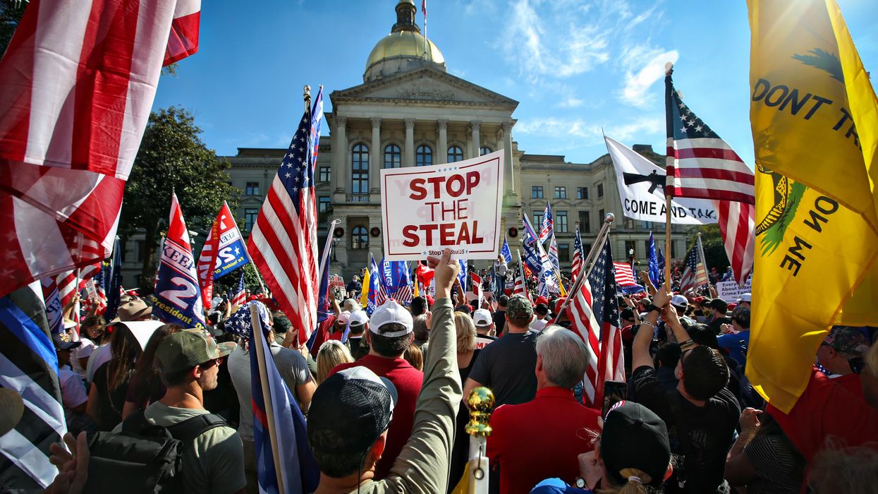 Signs that says "Stop the Steal" at a pro-Trump rally