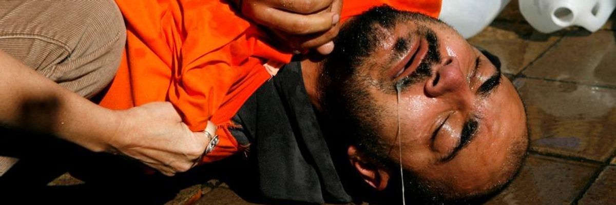 Simulation of waterboarding outside the US Justice Department