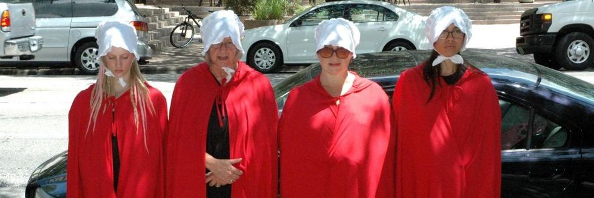 Women Dressed as 'Handmaids' to Confront 'Vicious Theocrat' Mike Pence in Philadelphia Over His Anti-Choice Agenda