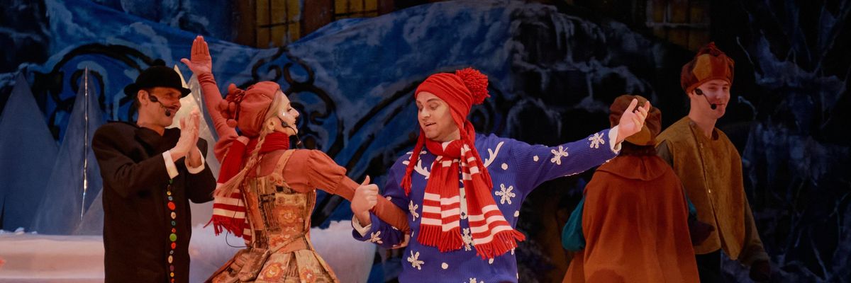Singers, dancers, actors and musicians of the Opera Theater perform Snow Queen for children and their families, many without power or water, on New Year's Day in Dnipro, Ukraine.