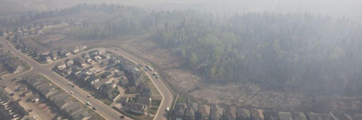 Tar Sands Operations Shut Down, Work Camps Evacuated as Fire Jumps North