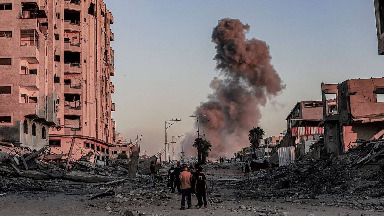 Smoke rises after Israeli strikes hit the Islamic University area in Gaza City,