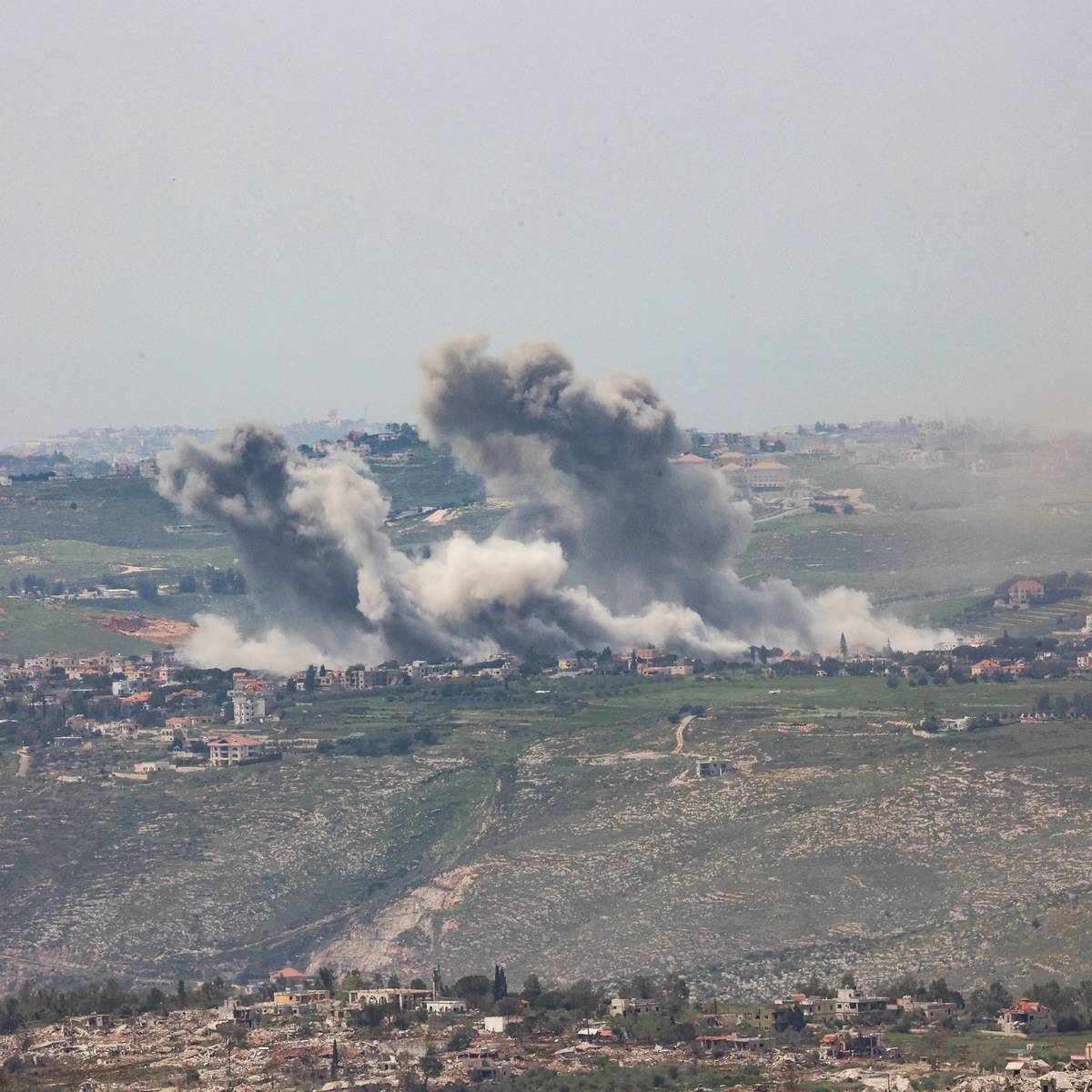 Smoke rises following an Israeli airstrike on a Lebanese village