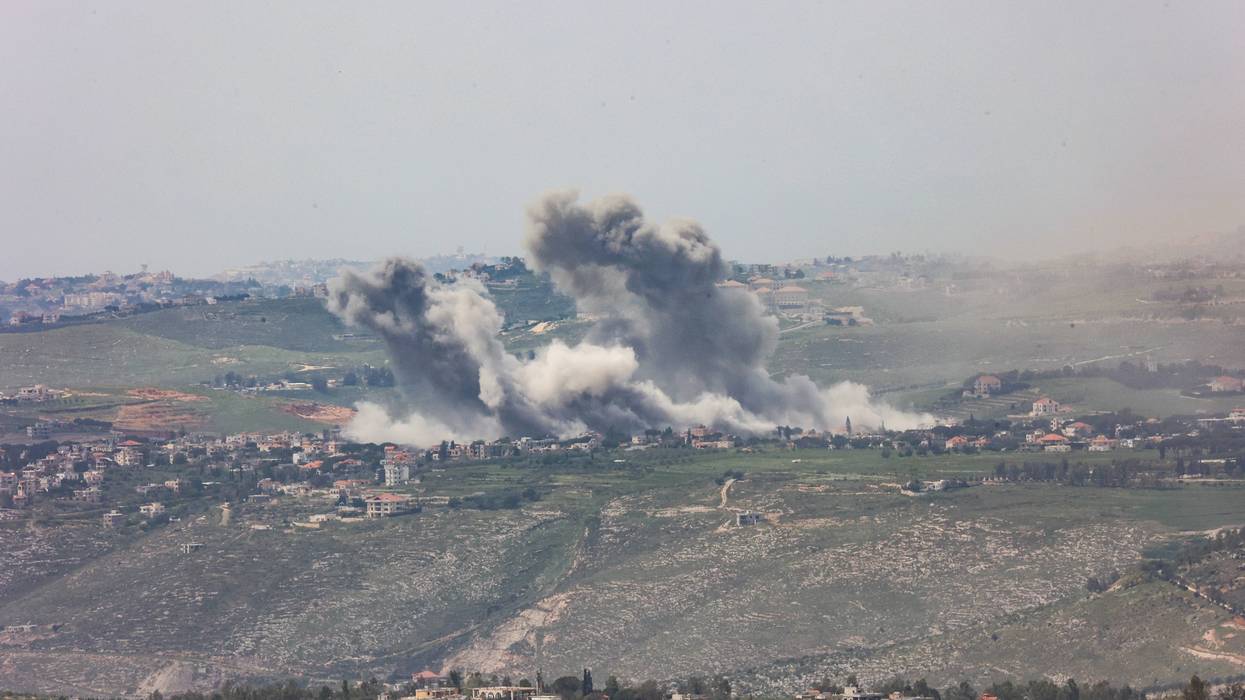 Smoke rises following an Israeli airstrike on a Lebanese village