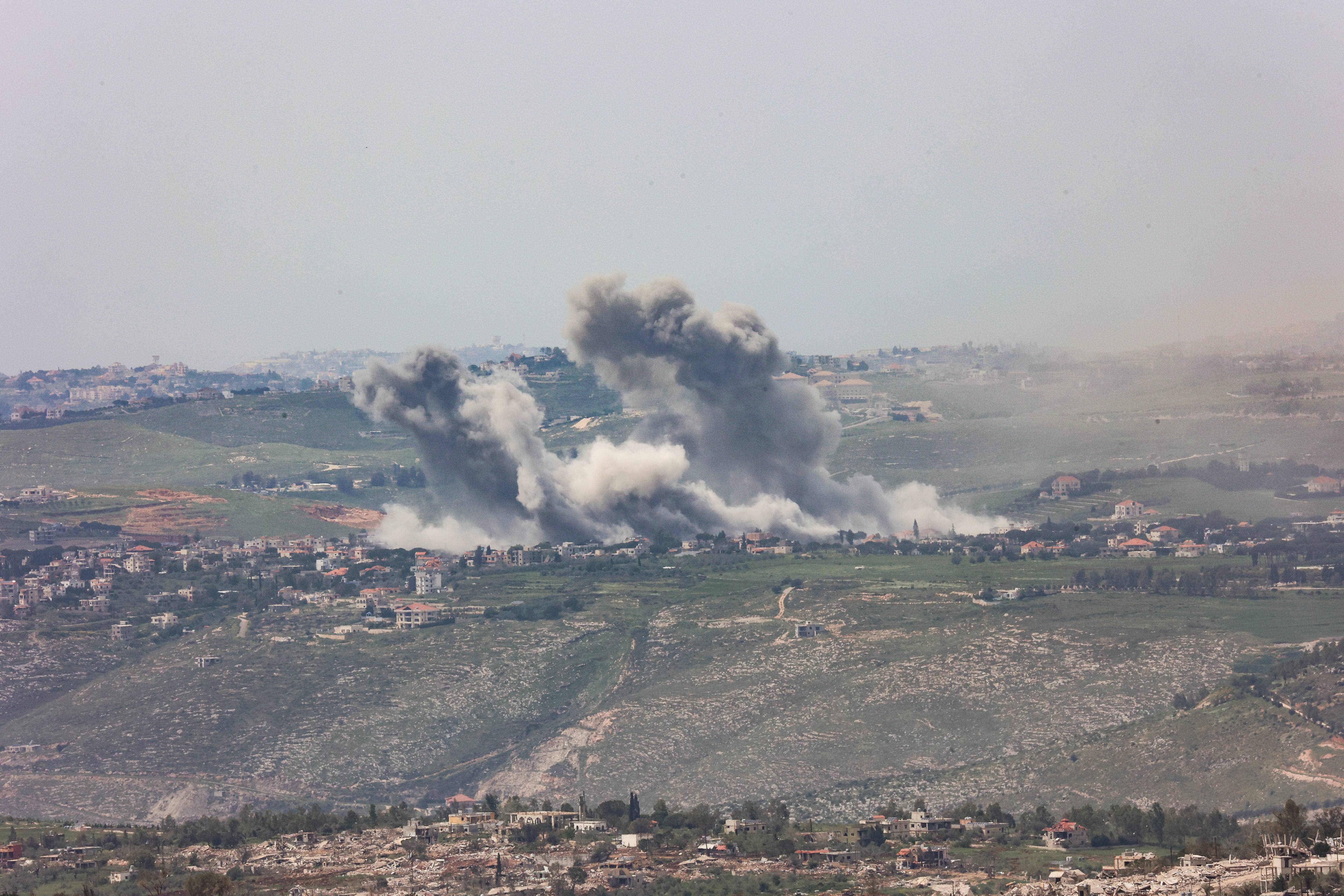 Smoke rises following an Israeli airstrike on a Lebanese village