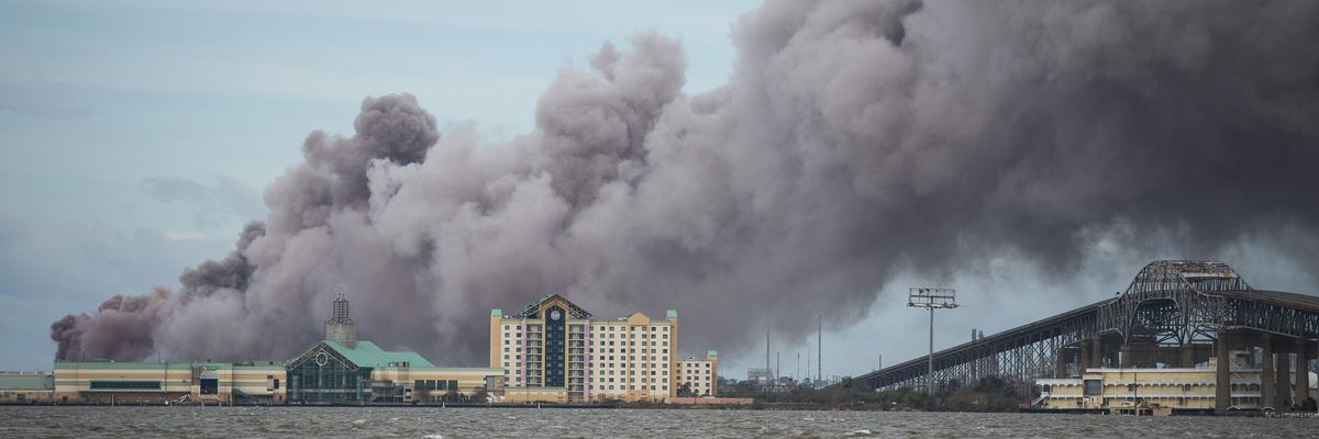 Smoke rises from a burning chemical plant after the passing of Hurricane Laura in Lake Charles, Louisiana on August 27, 2020.