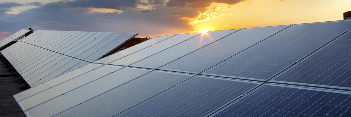 Solar panels are shown with the sun