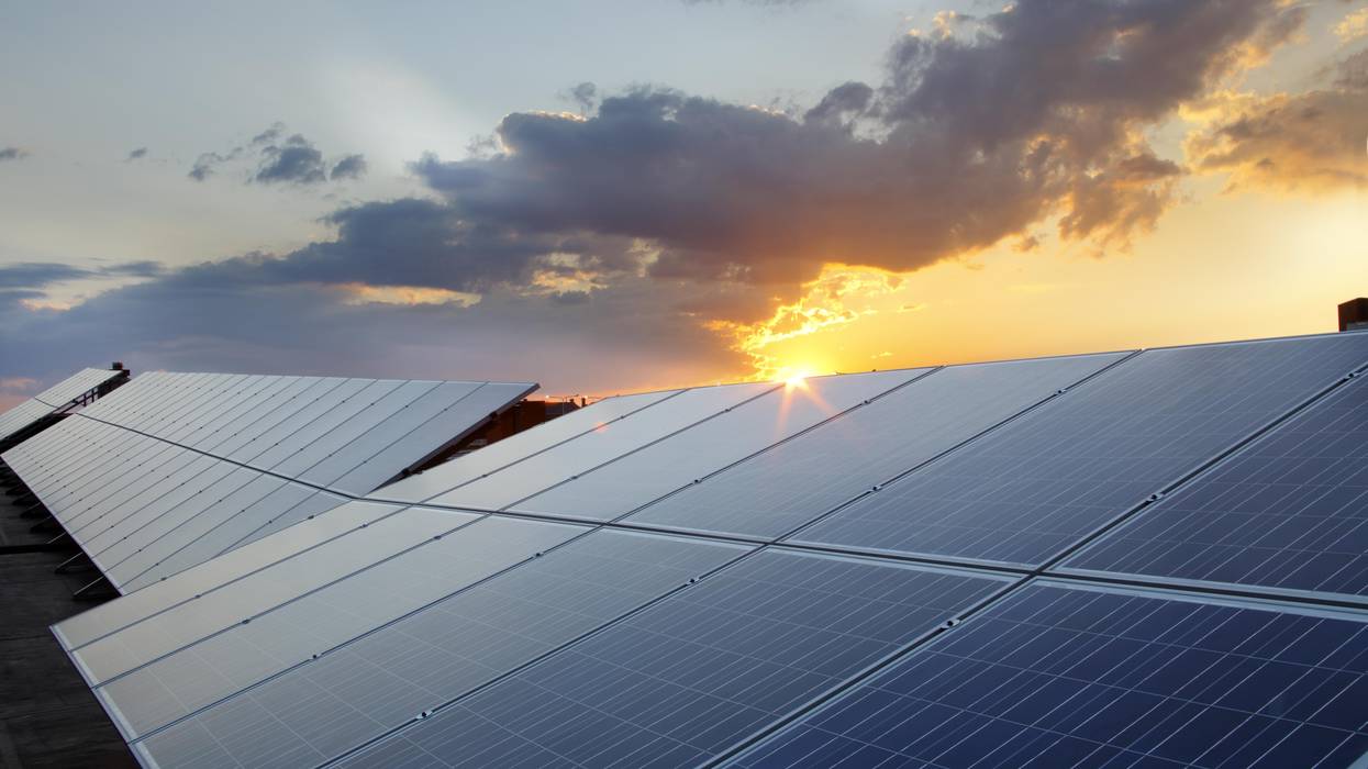 Solar panels are shown with the sun