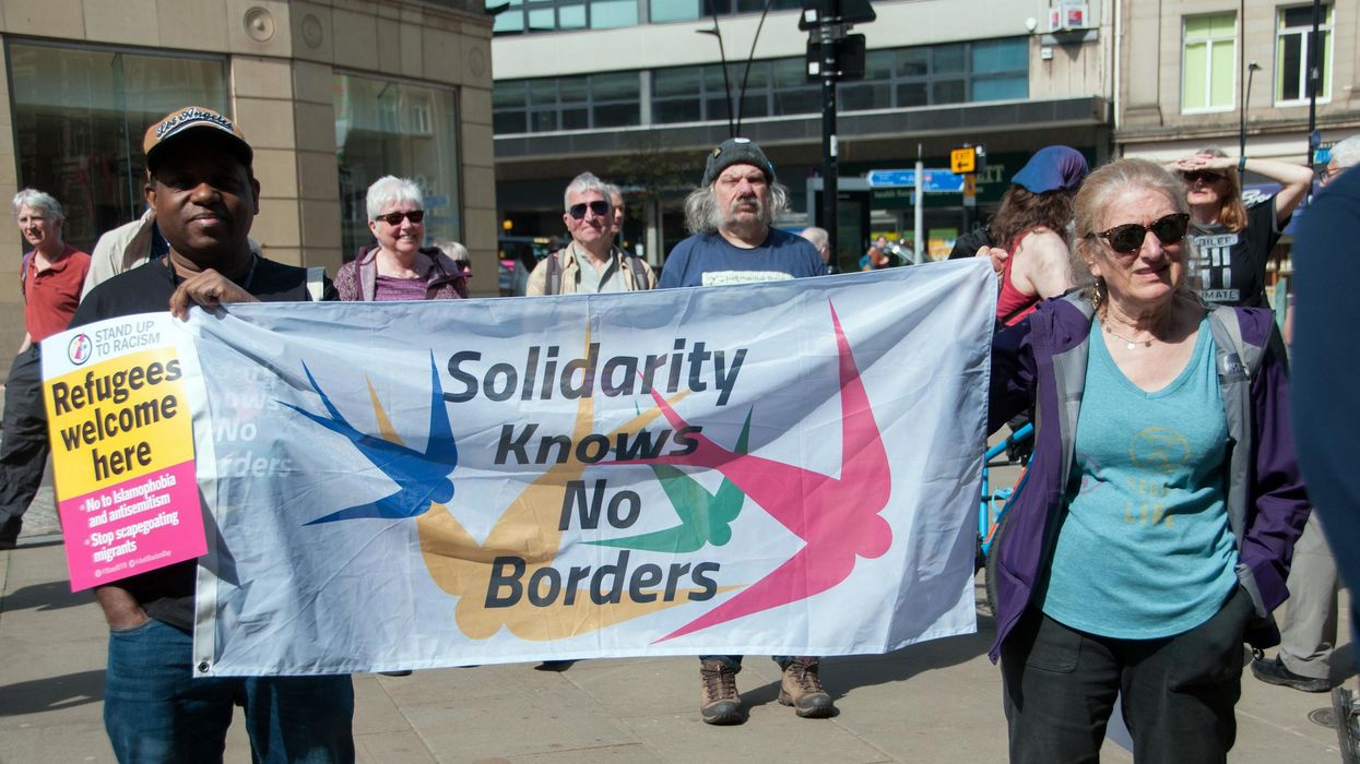 solidarity with Rwandan migrants