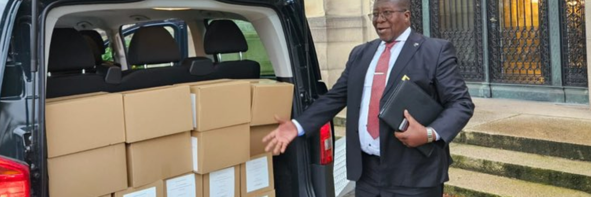 South African Ambassador to the Netherlands Vusi Madonsela delivers boxes of evidence in Israel's ICJ genocide trial