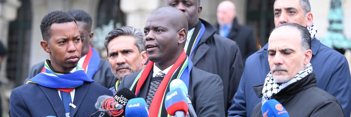 South African Justice Minister Ronald Lamola speaks at a press conference outside the ICJ.