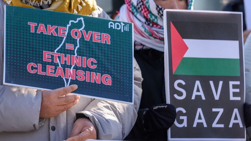 South Korean activists hold placards to protest against U.S...