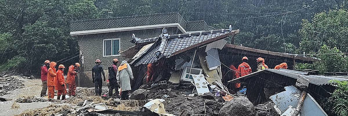 South Korean emergency workers search for survivors