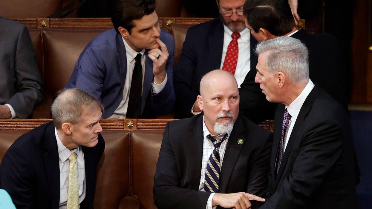 Speaker of the House Kevin McCarthy (R-CA) (R) talks to Reps. Chip Roy (R-TX) (C) and Jim Jordan (R-OH)