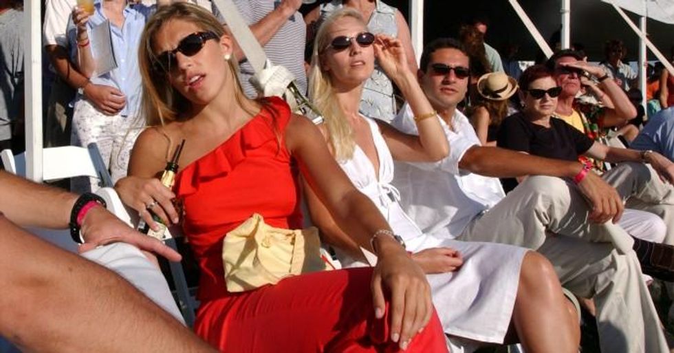 Spectators watch the Mercedes-Benz Polo Challenge July 21, 2001 in Bridgehampton, New York. (Photo: Spencer Platt/Getty Images)