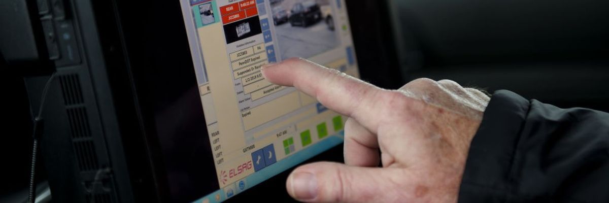Spring Township Police Chief Bryan D. Ross shows how the license plate scanners work through the screen inside the car. The Spring Township Police Department is starting to use license plate scanners. Photo by Lauren A. Little 1/16/2019