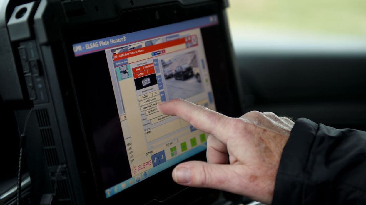 Spring Township Police Chief Bryan D. Ross shows how the license plate scanners work through the screen inside the car. The Spring Township Police Department is starting to use license plate scanners. Photo by Lauren A. Little 1/16/2019