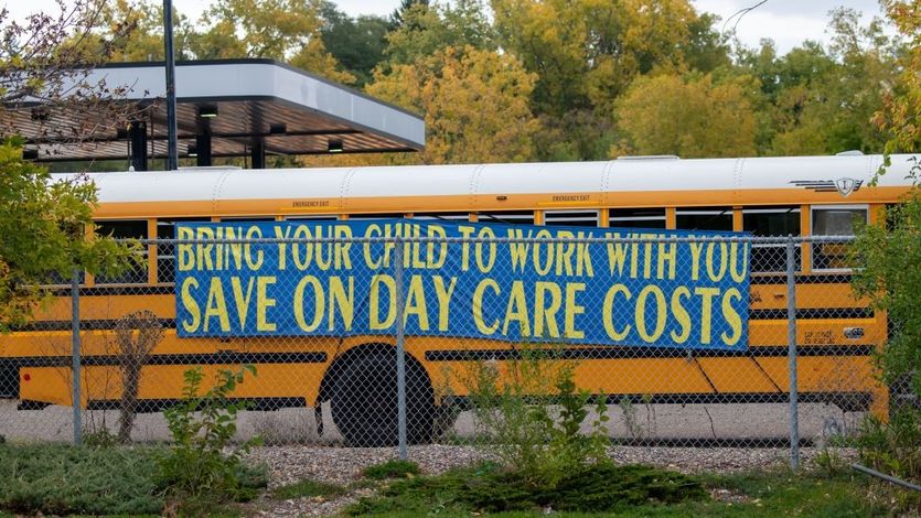 St. Paul, Minnesota. Sign advertising for bus drivers and bring your child to work with you.
