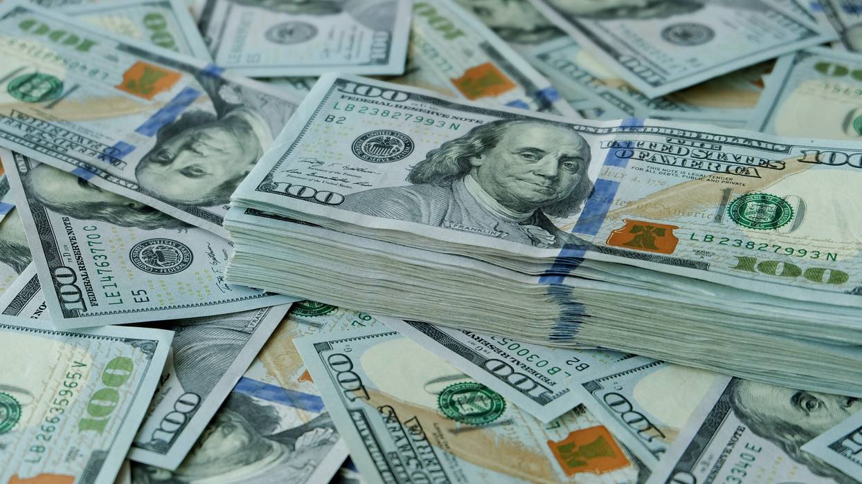 Stacking of US Dollar bank notes.