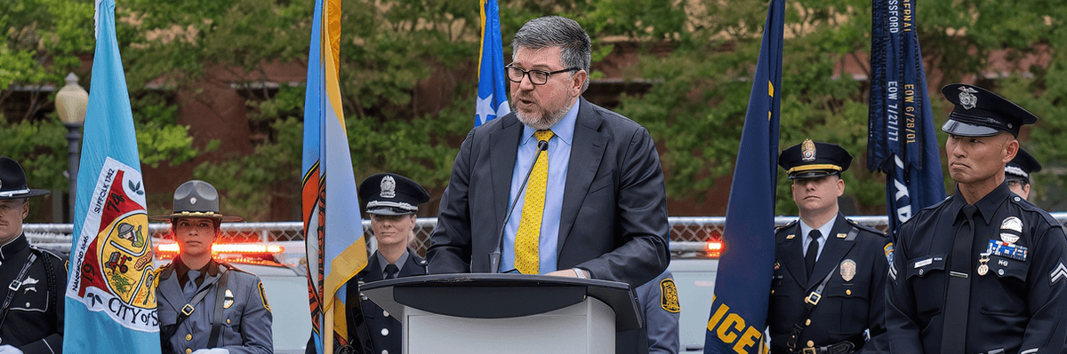 Stanley Woodward speaks at an event honoring slain police K-9 dogs