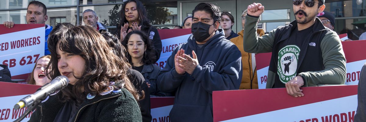 Starbucks workers rally in front of a store in downtown Los Angeles
