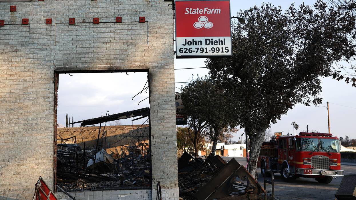 State Farm sign on burned building