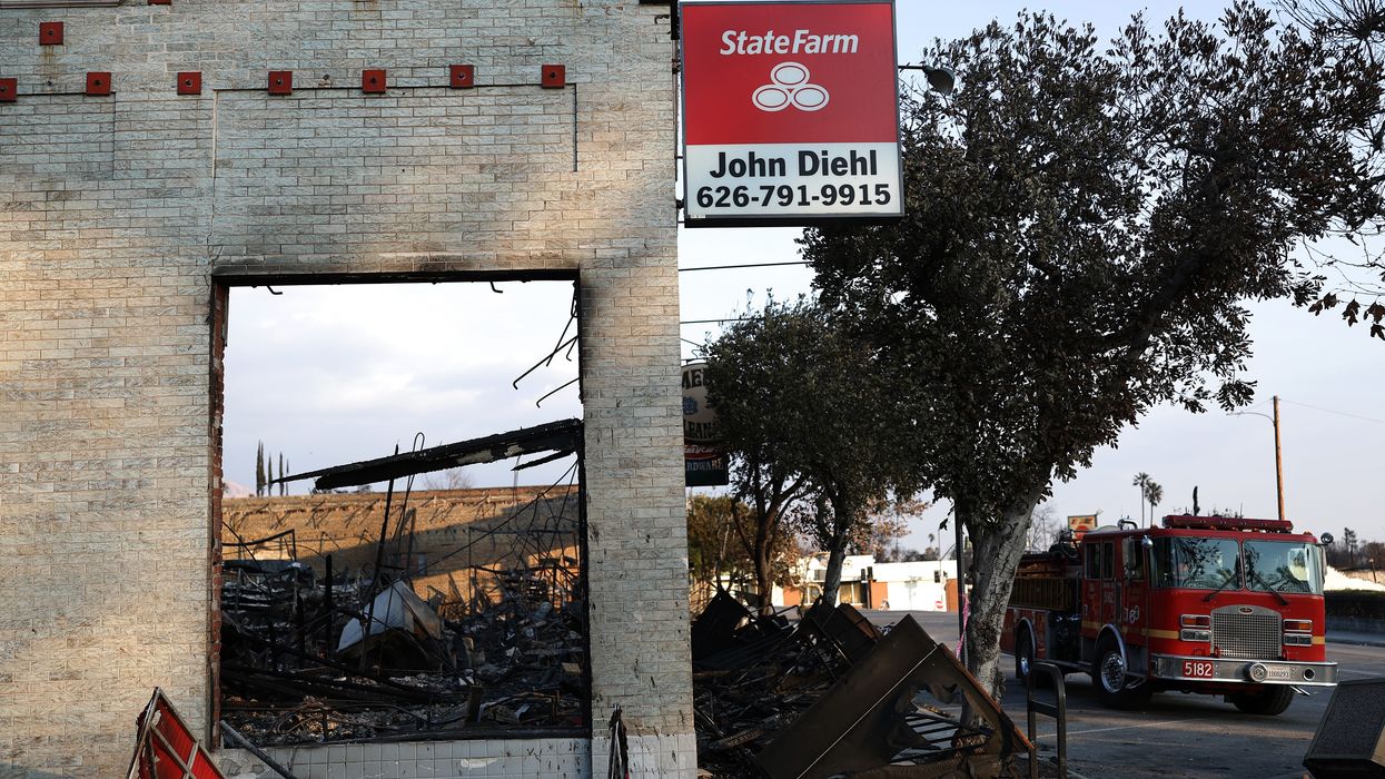 State Farm sign on burned building