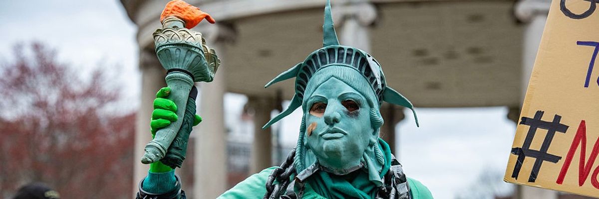 Statue of Liberty as a zombie at Trump protest