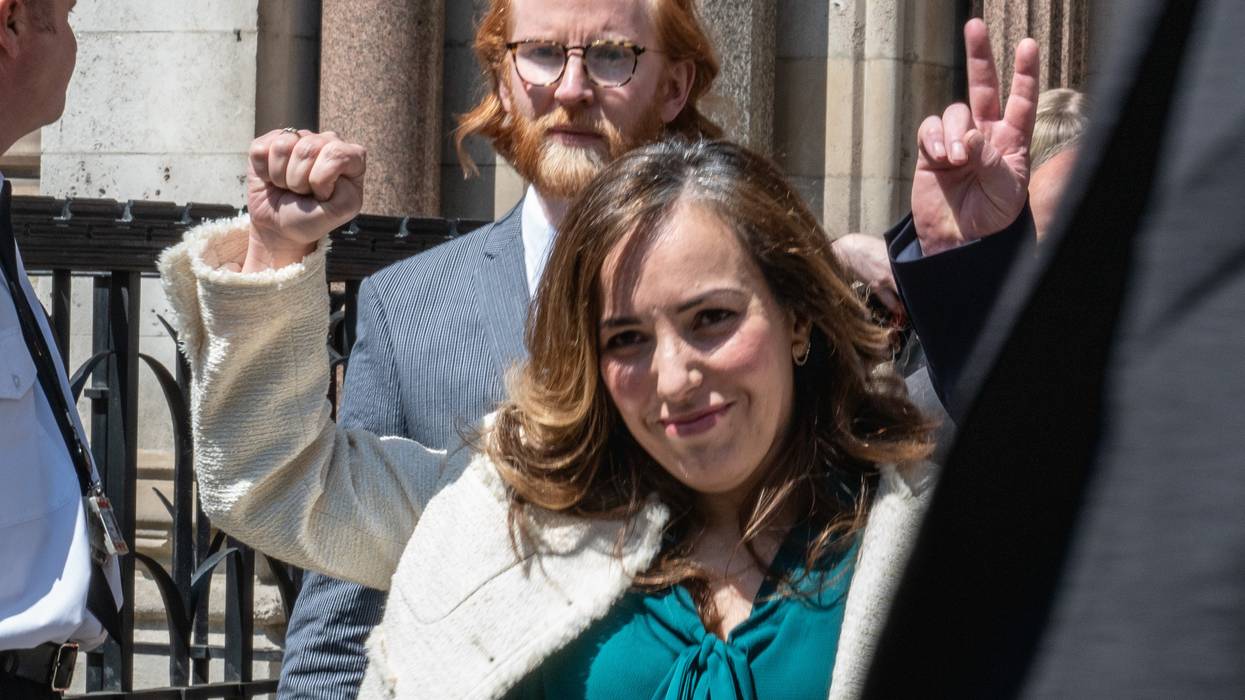 Stella Assange celebrates.