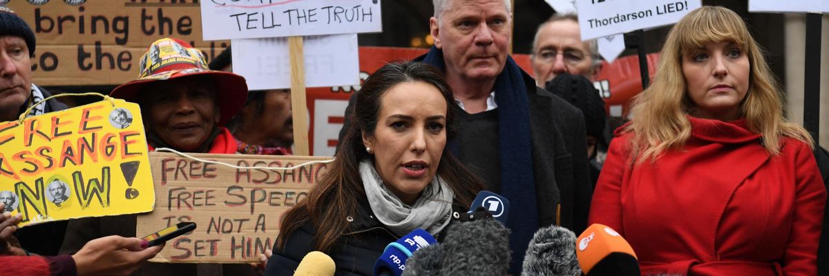 Stella Moris speaks at a press conference