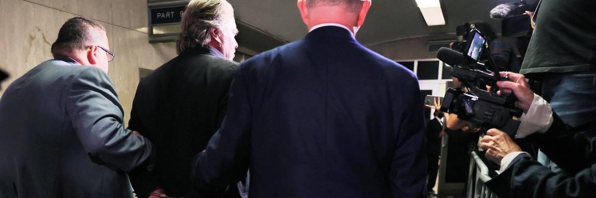 Steve Bannon handcuffed at his 2022 arraignment in New York on state charges of defrauding We Build the Wall contributors.