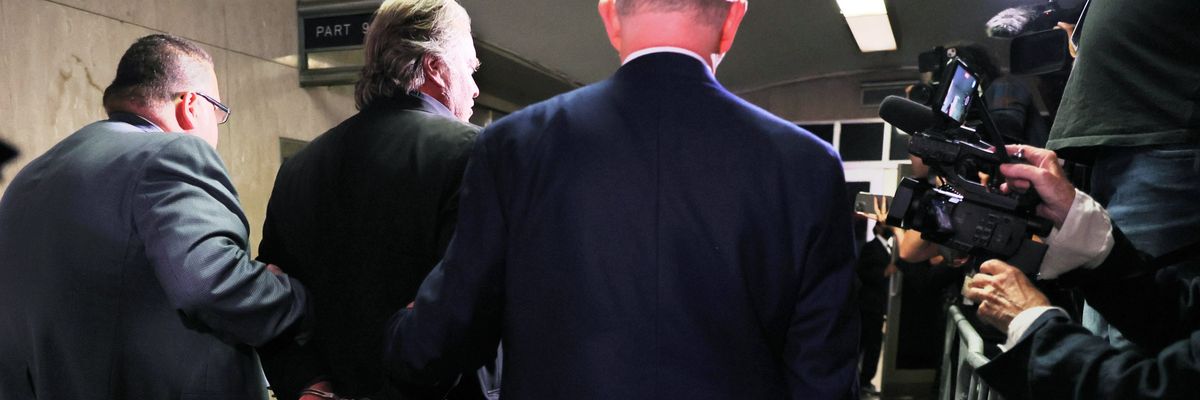 Steve Bannon handcuffed at his 2022 arraignment in New York on state charges of defrauding We Build the Wall contributors.