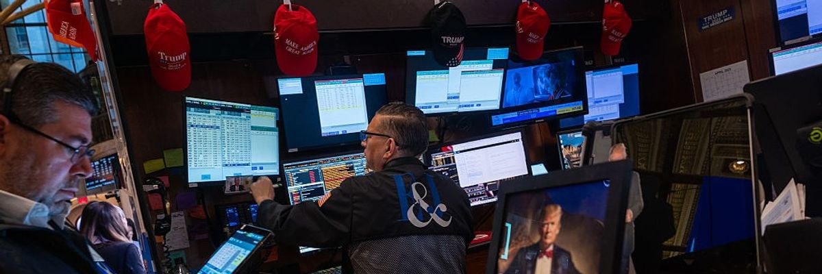 Stock traders surrounded by Trump gear