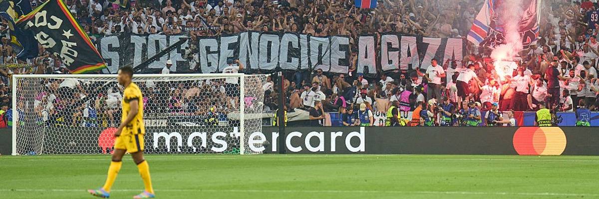 'Stop Genocide in Gaza' sign reads at PSG vs FC Milan game in Munich 2025