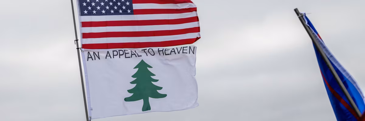 Stop the steal and seek the truth and encourage action rally for president Trump at the State Capitol. An appeal to heaven flag.