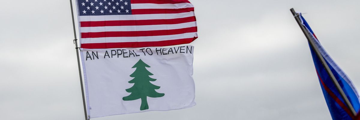 Stop the steal and seek the truth and encourage action rally for president Trump at the State Capitol. An appeal to heaven flag.
