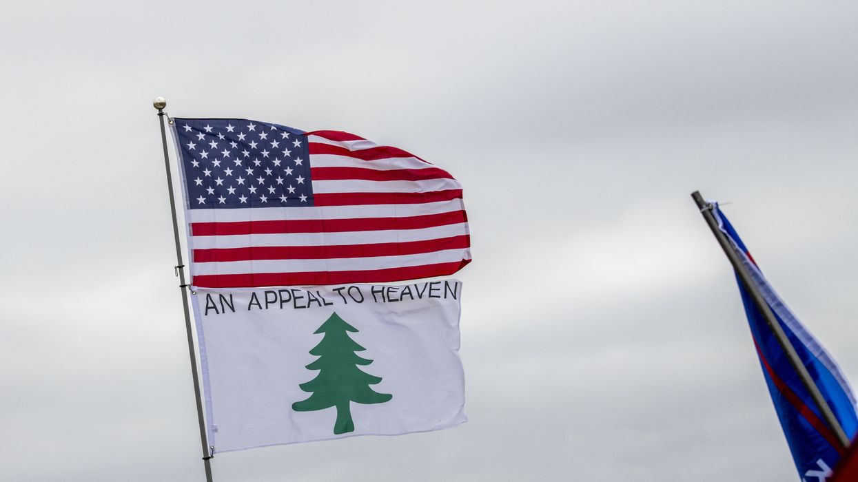 Stop the steal and seek the truth and encourage action rally for president Trump at the State Capitol. An appeal to heaven flag.