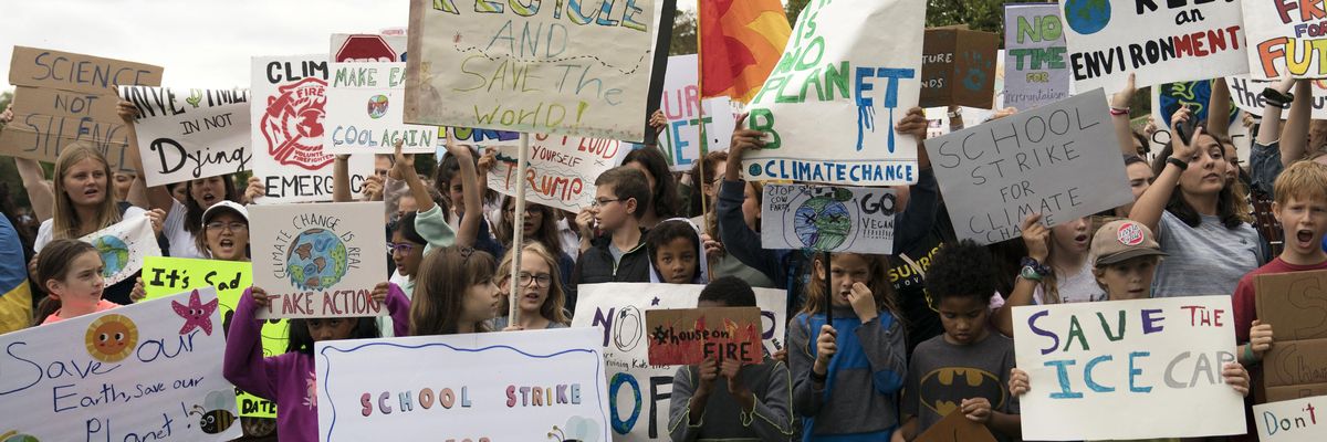 Student environmental advocates participate in a strike to demand action be taken on climate change outside the White House on September 13, 2019 in Washington, DC.