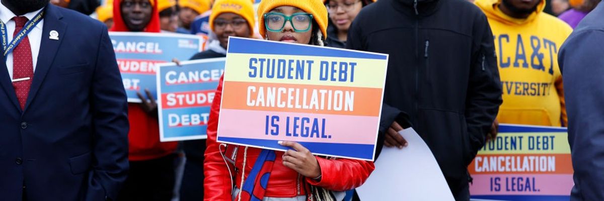 Student loan borrowers and advocates gather for a rally outside the U.S. Supreme Court on February 28, 2023.