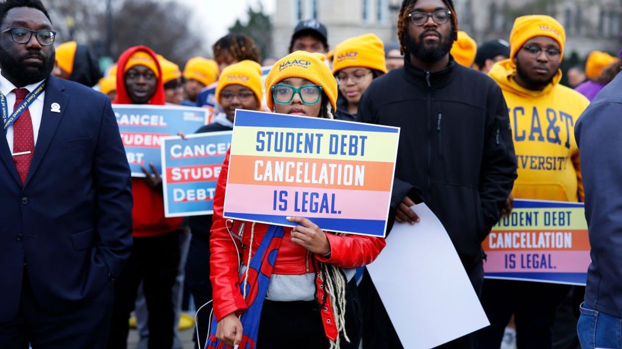 Student loan borrowers and advocates gather for a rally outside the U.S. Supreme Court on February 28, 2023.