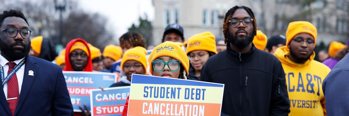 Student loan borrowers and advocates gather for a rally outside the U.S. Supreme Court on February 28, 2023.