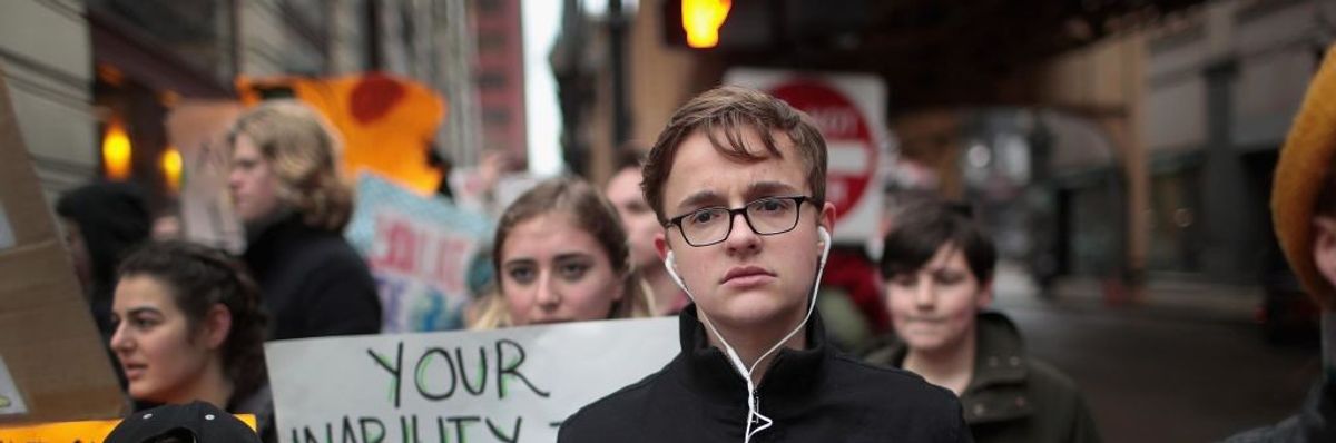 Students and activists participate in a climate change "strike" on March 15, 2019 in Chicago