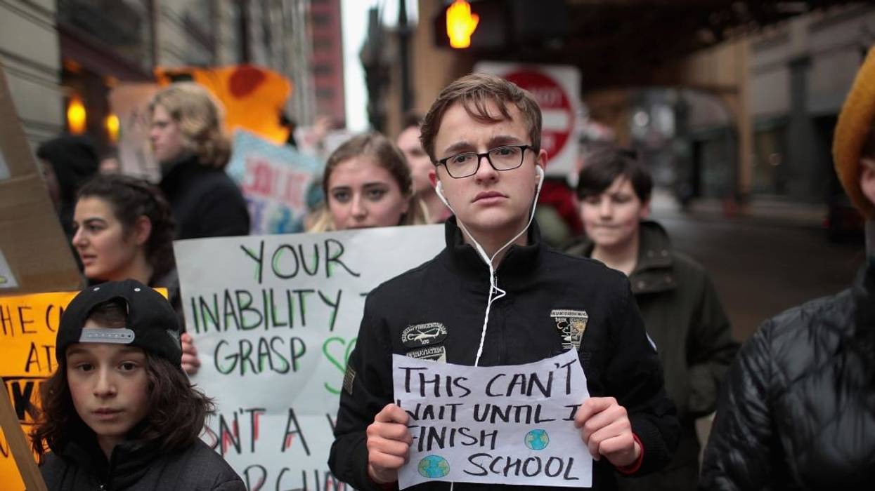 Students and activists participate in a climate change "strike" on March 15, 2019 in Chicago