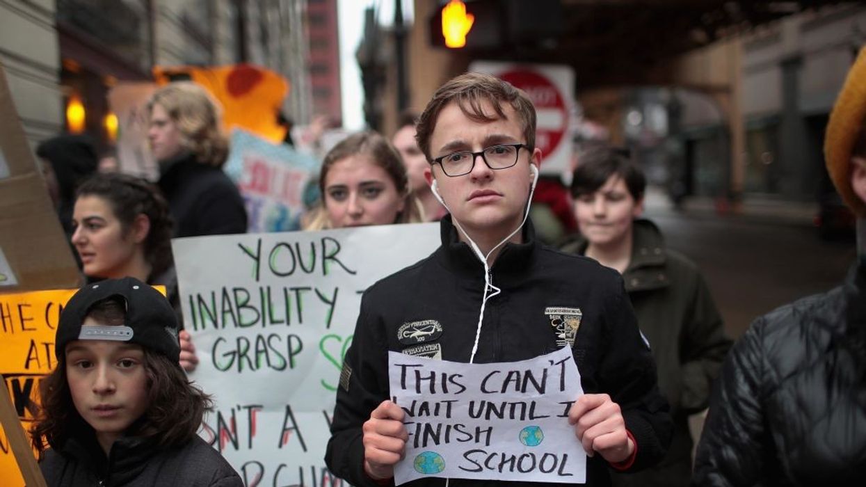 Students and activists participate in a climate change "strike" on March 15, 2019 in Chicago