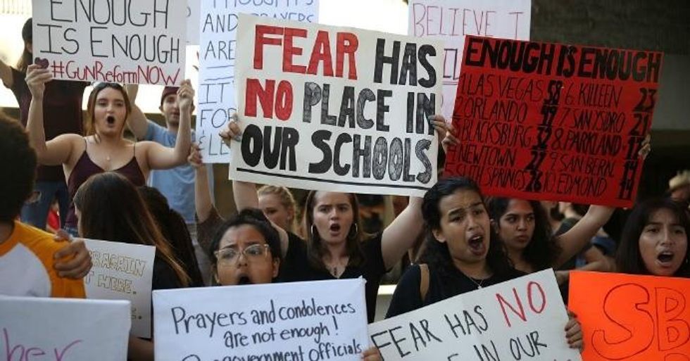 Students and advocates join together after a school shooting that killed 17 to protest against guns on the steps of the Broward County Federal courthouse on Feb. 17, 2018 in Fort Lauderdale, Florida. (Photo: Joe Raedle/Getty Images)