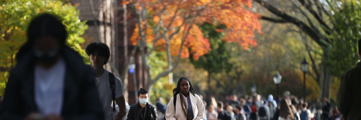 Students are seen walking on Brown University's campus in Providence, Rhode Island on November 11, 2021.