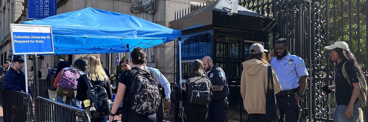 Students pass through check point to enter Columbia.