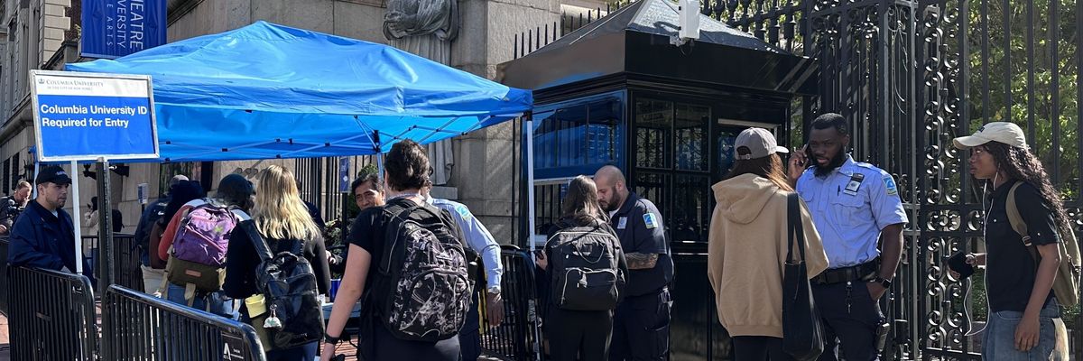 Students pass through check point to enter Columbia.