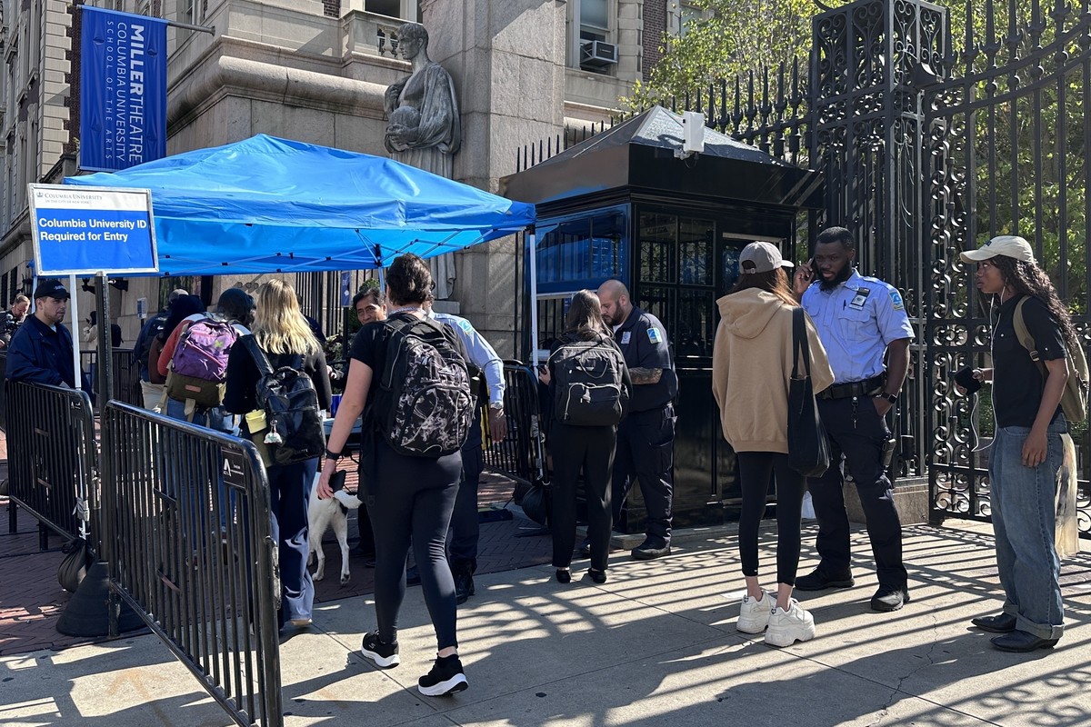 Students pass through check point to enter Columbia.