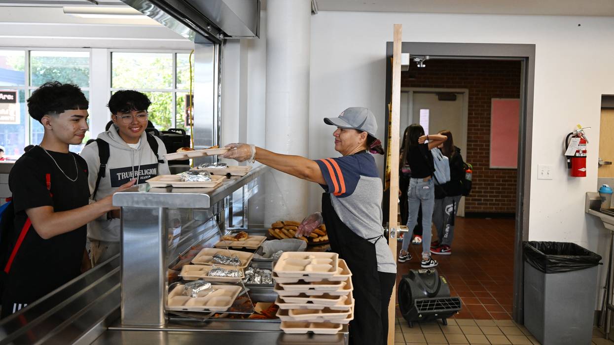 Students pick up their lunch at the school cafeteria